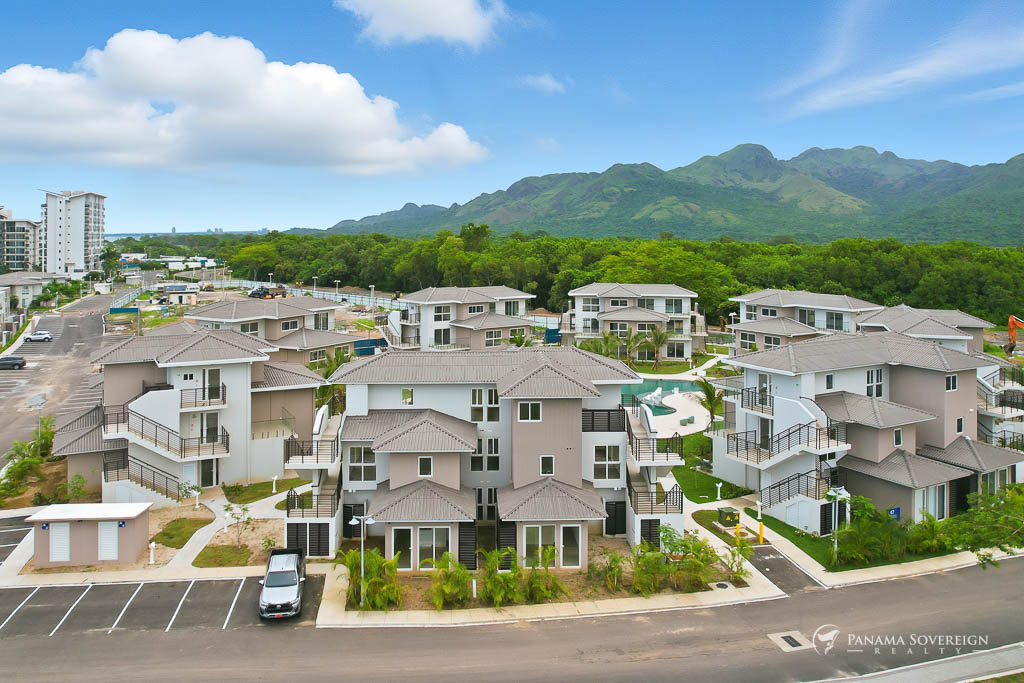 View of the community framed by surrounding nature and mountain ranges.