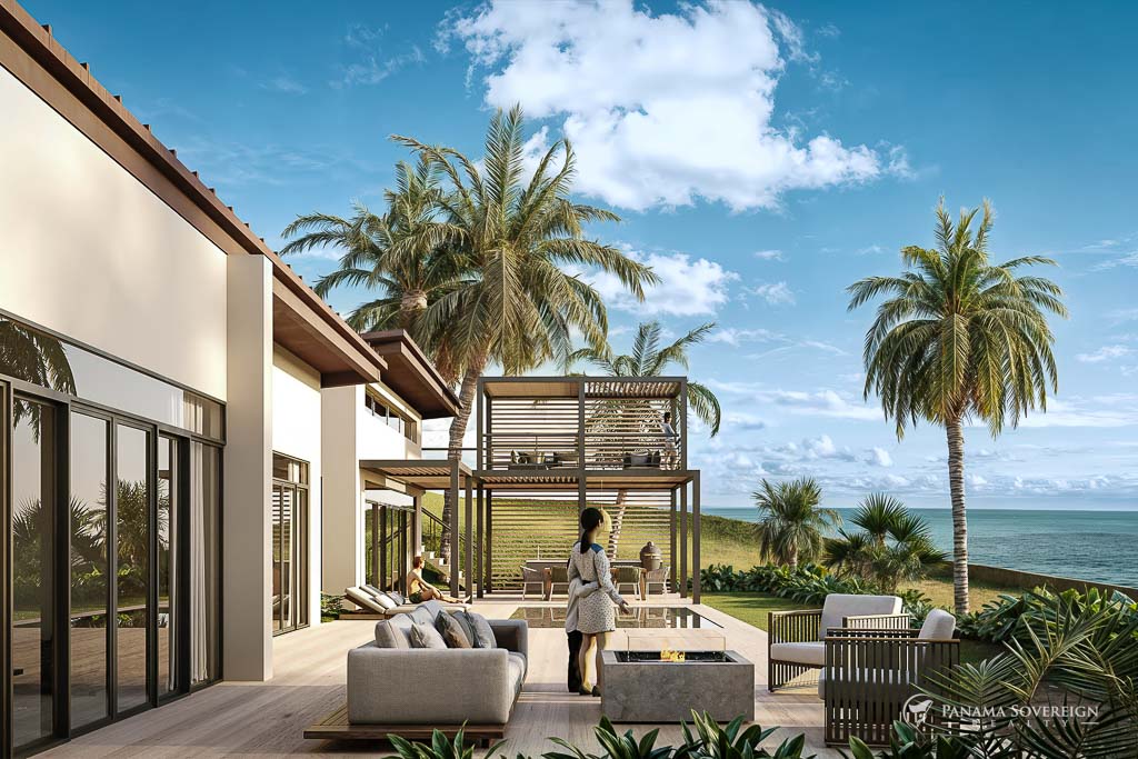 Elevated deck with ocean views, firepit, and lounge seating surrounded by tropical landscaping and palm trees.