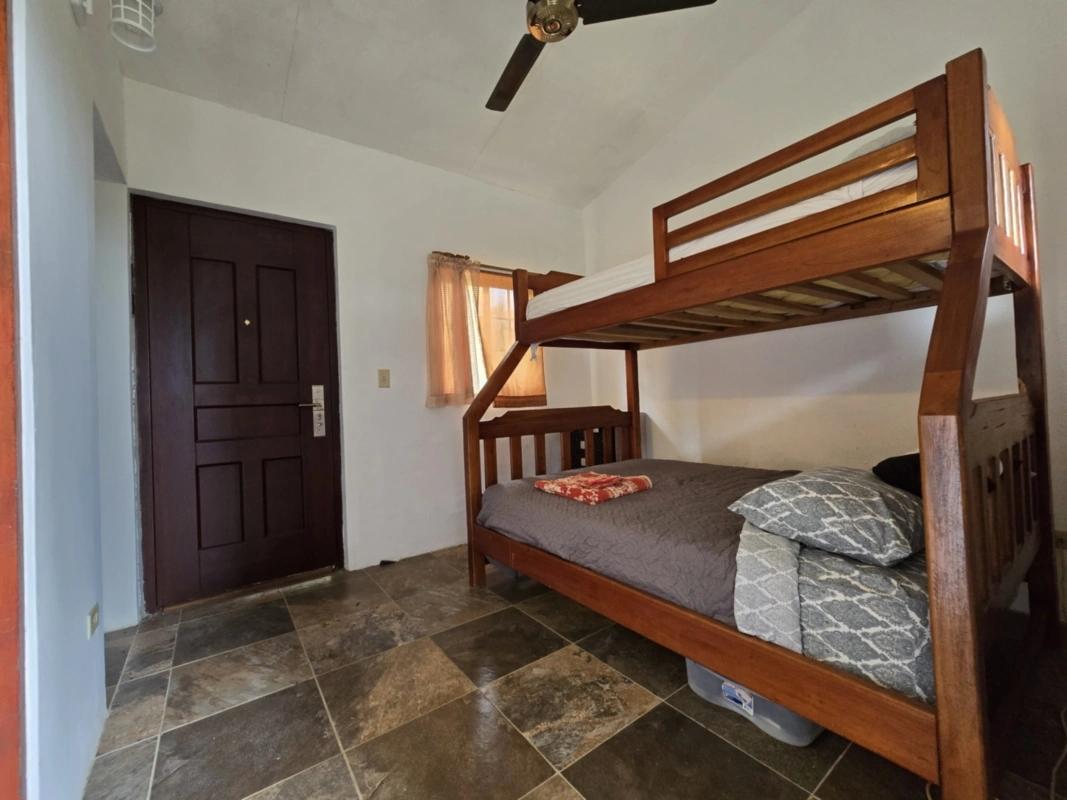 CENTRALLY-LOCATED LOT WITH 2 RENTAL STUDIOS